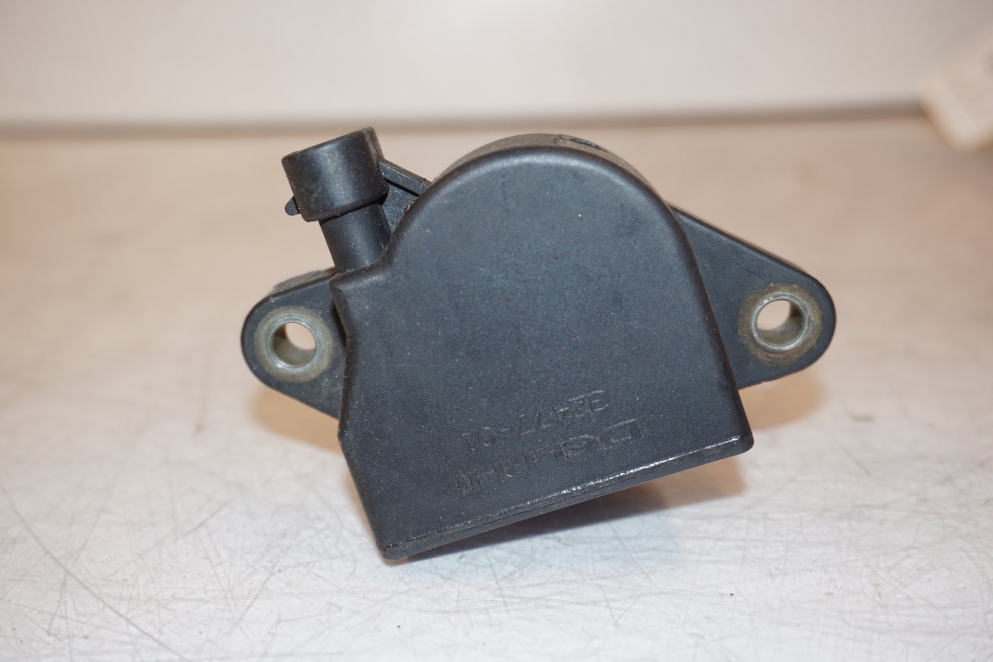 Snett uppifrån på Tändspole från en H-D V-Rod 1130 -2006 motorcykel.