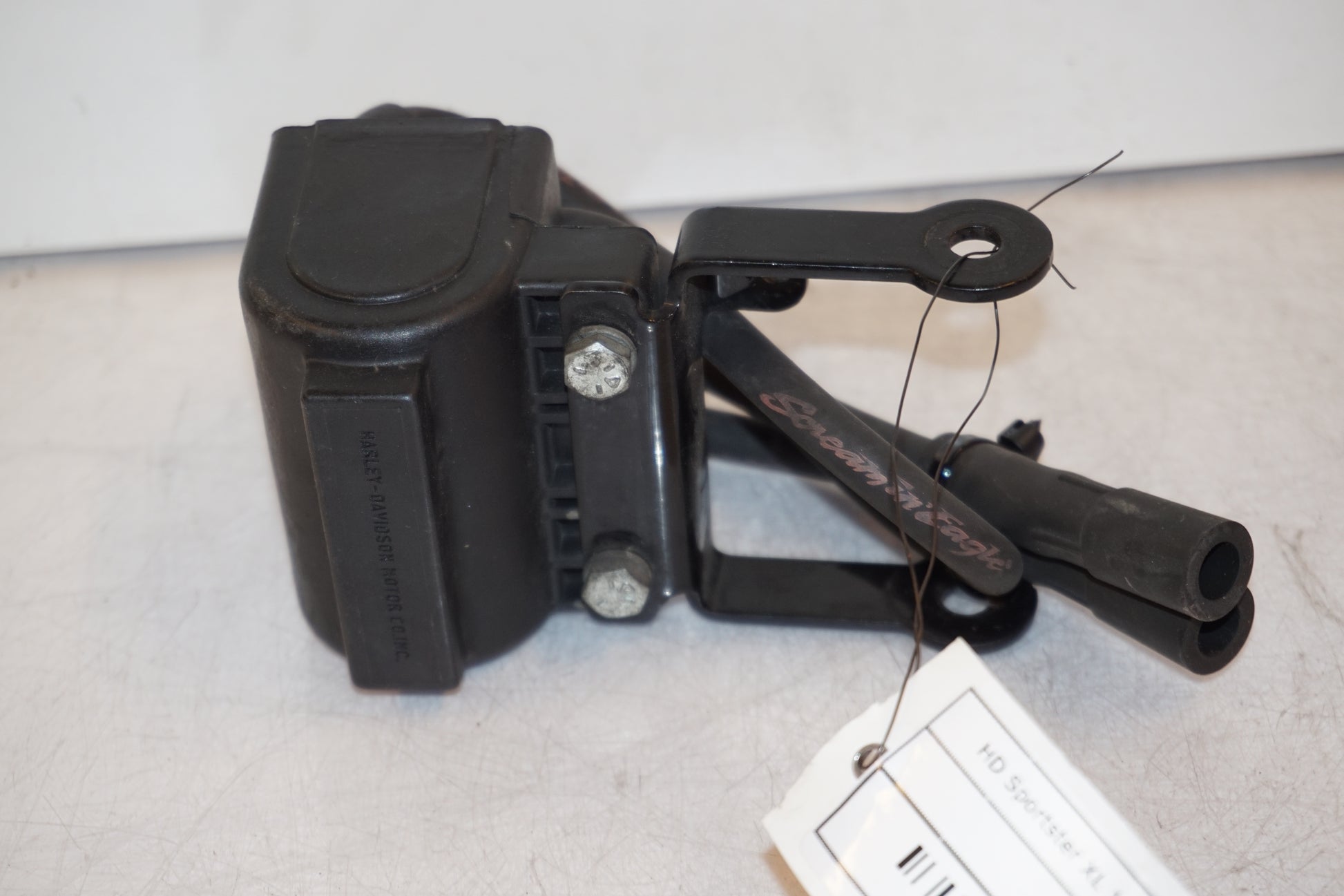 Framsidan på Tändspole från en H-D Sportster 1200 XL1200C -1999 motorcykel.