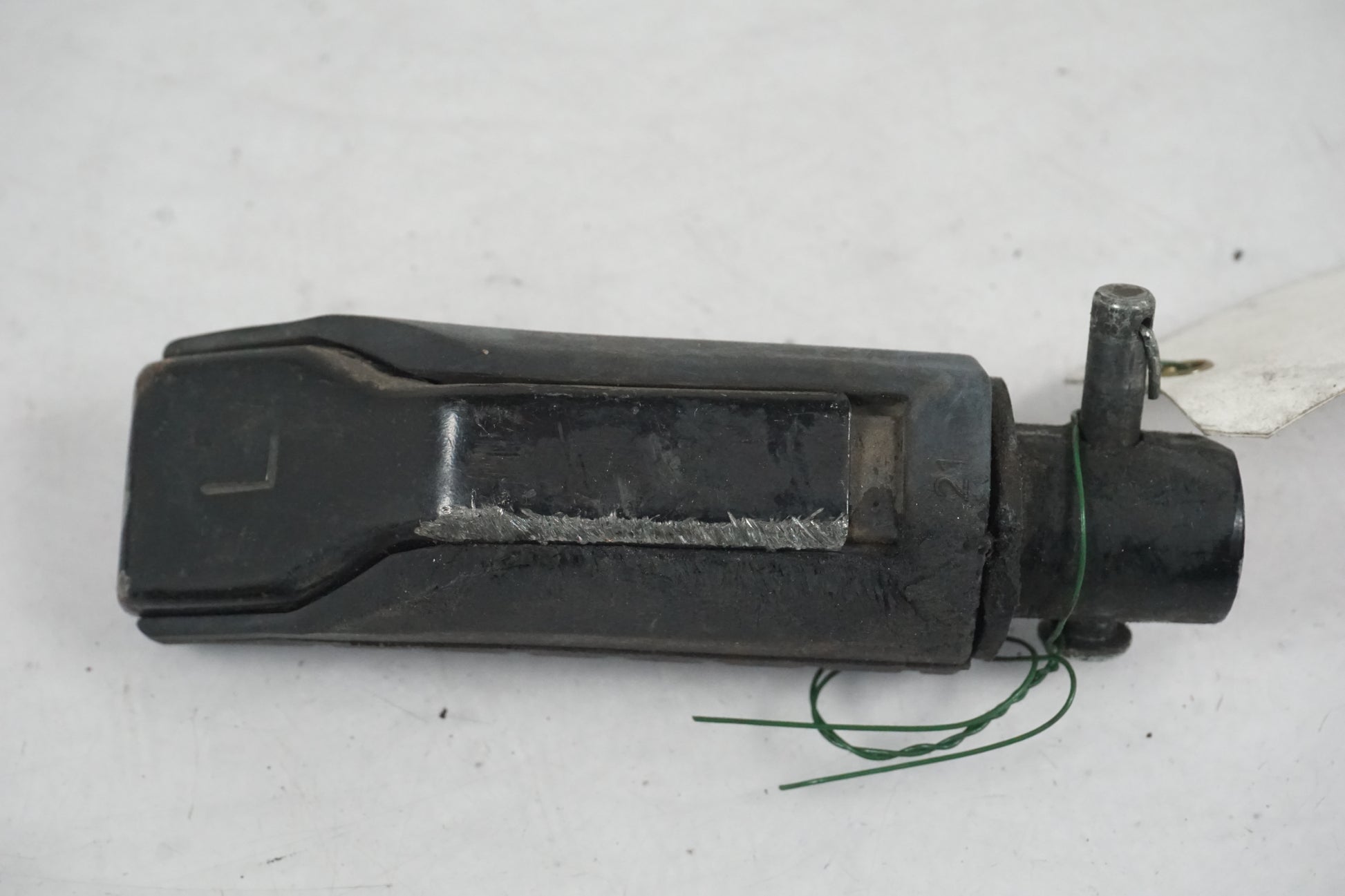 Baksidan på Fotpinne från en Honda CBR 125 R -2005 motorcykel.