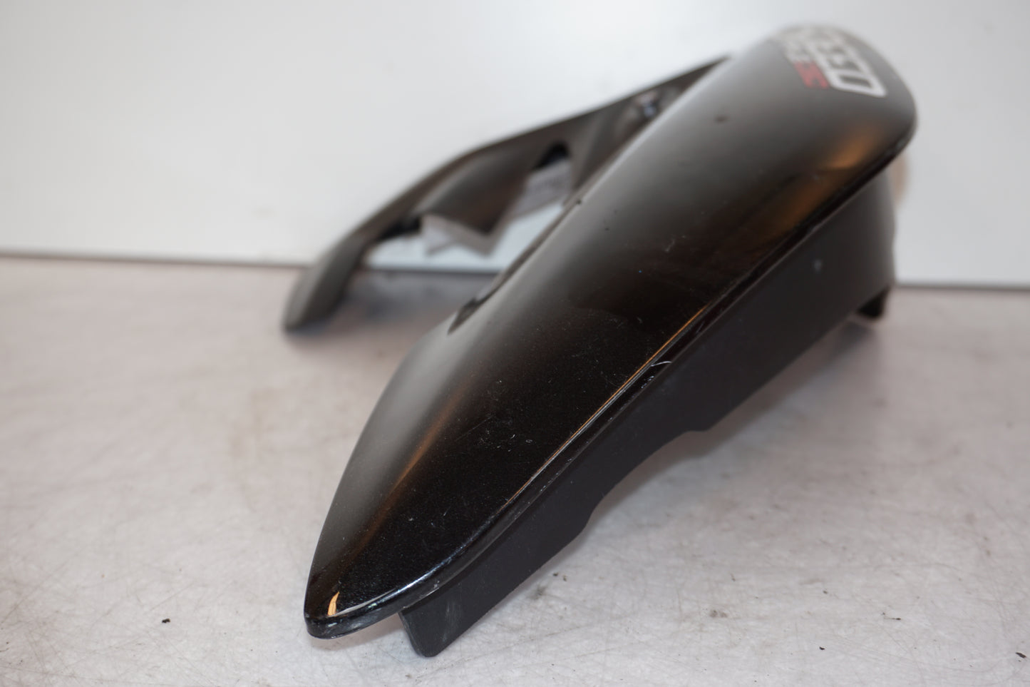 Snett uppifrån på Kylarvinge från en Triumph Speed Triple -2011 motorcykel.