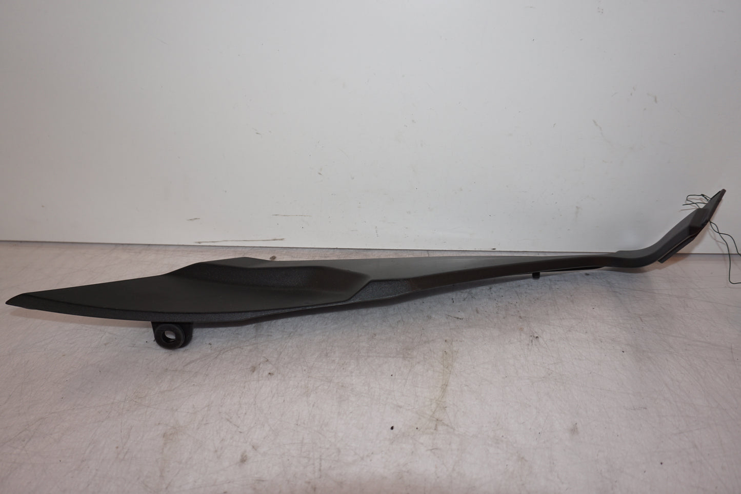 Baksidan på Sidopanel från en Triumph Tiger -2012 motorcykel.