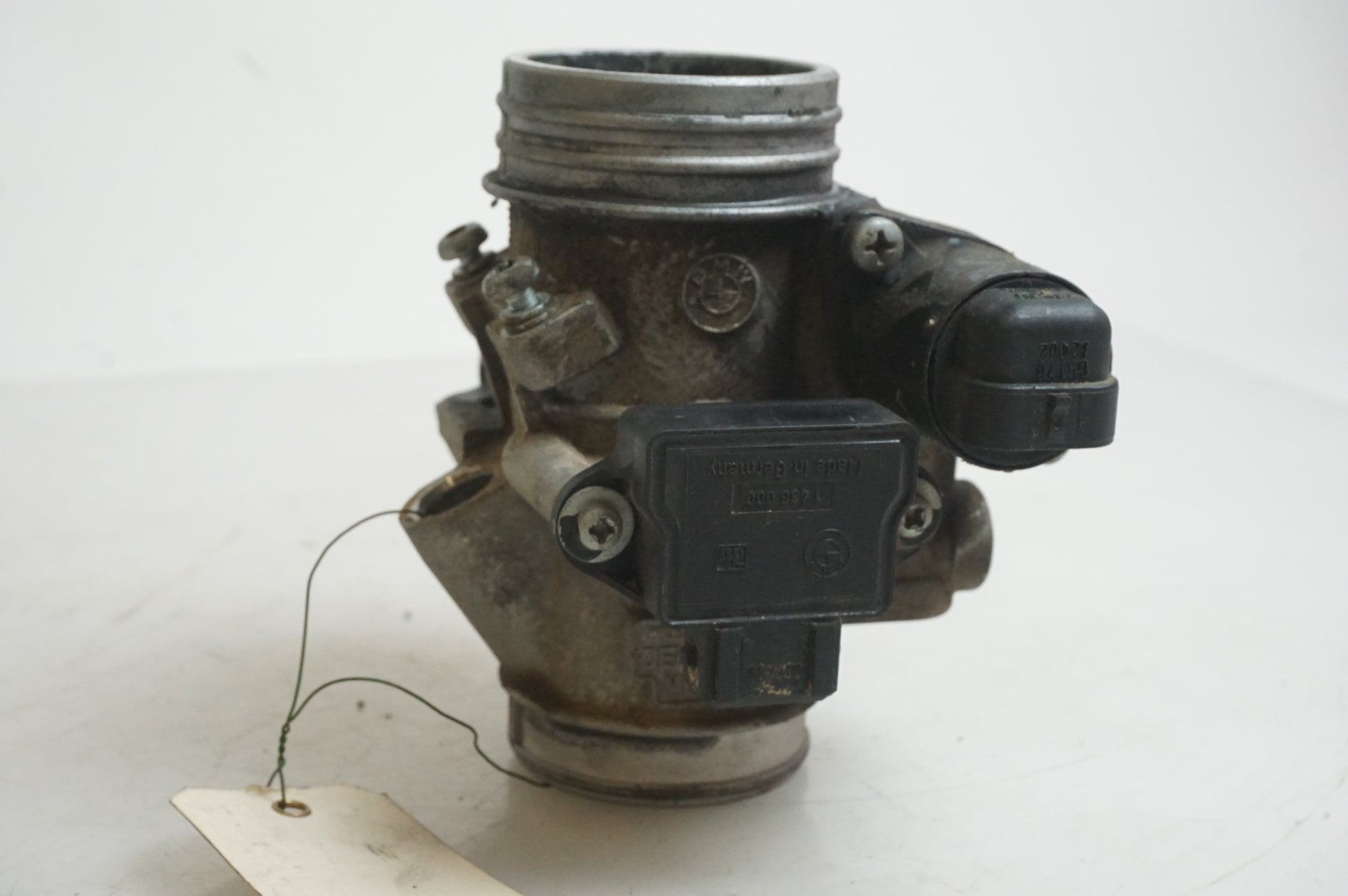 Baksidan på Spjällhus från en BMW F 650 GS -2003 motorcykel.