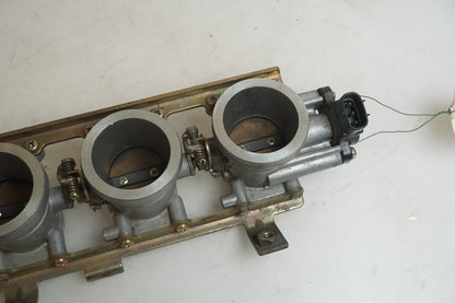 Baksidan på Spjällhus från en Triumph TT 600 -2000 motorcykel.