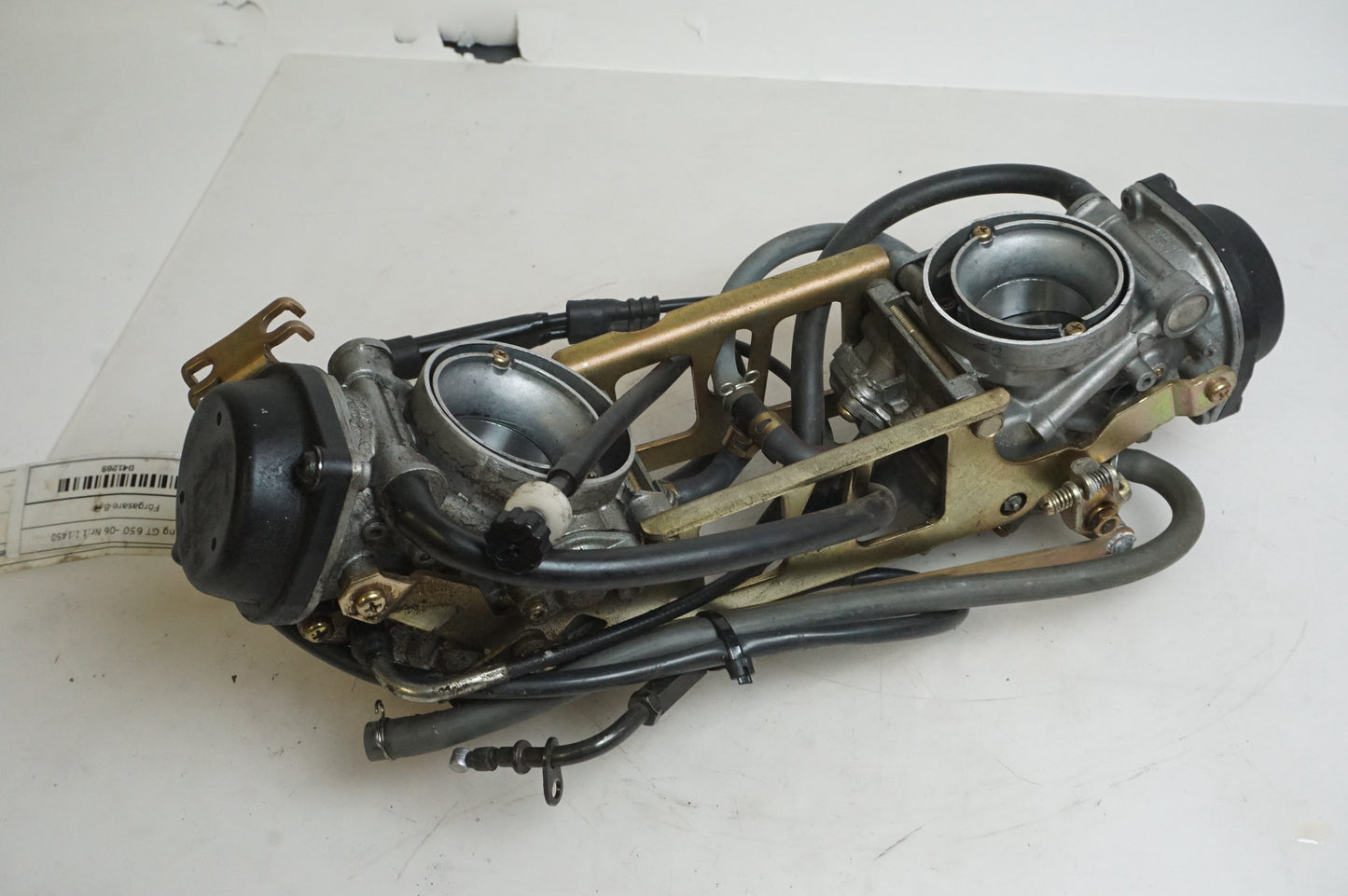 Framsidan på Förgasare från en Hyosung GT 650 -2006 motorcykel.