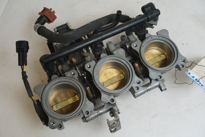 Framsidan på Spjällhus från en Triumph Street Triple -2009 motorcykel.