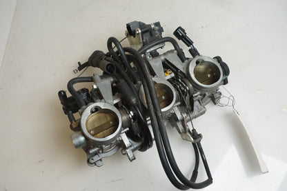 Höger sida på Spjällhus från en Triumph Street Triple R -2009 motorcykel.