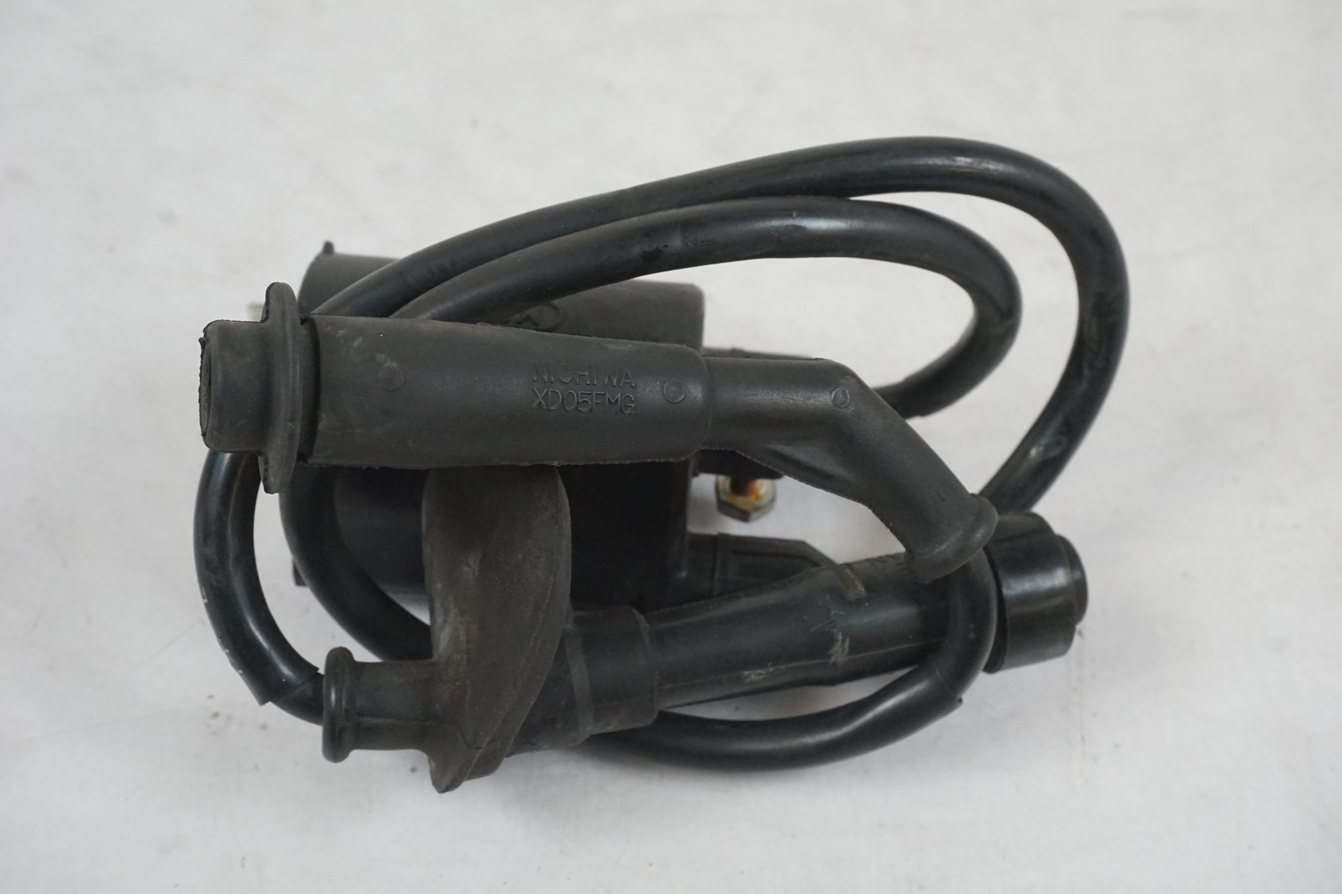 Framsidan på Tändspole från en Honda VT 600 C -1995 motorcykel.