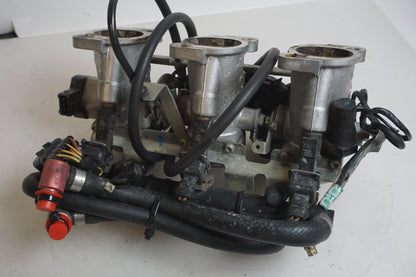 Baksidan på Spjällhus från en Triumph Tiger -2002 motorcykel.