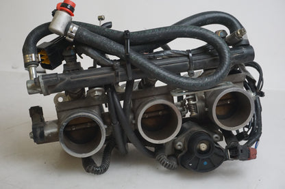 Snett uppifrån på Spjällhus från en Triumph Tiger -2002 motorcykel.