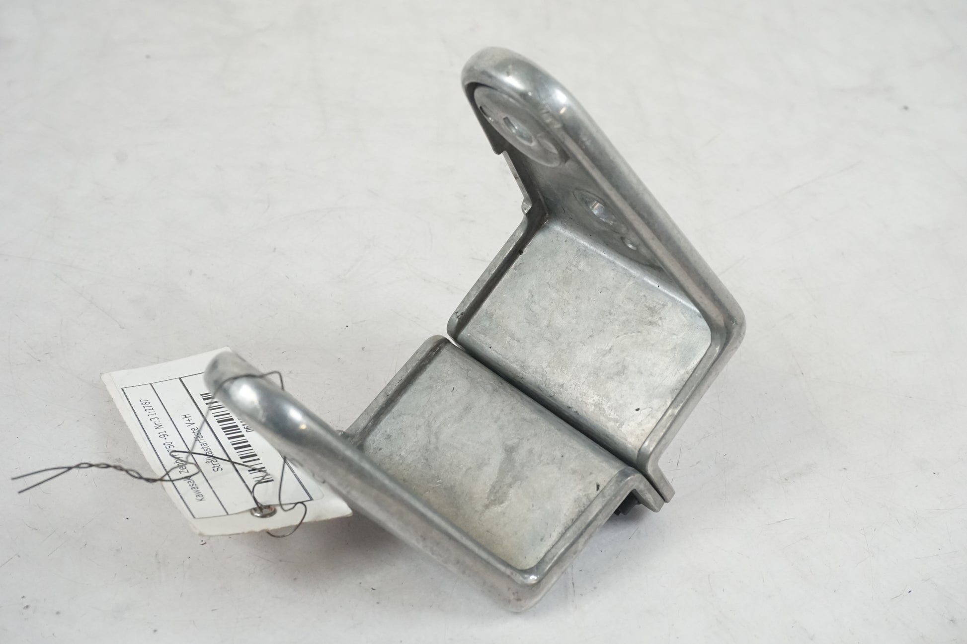 Höger sida på Strålkastarfäste från en Kawasaki Zephyr 750 -1991 motorcykel.