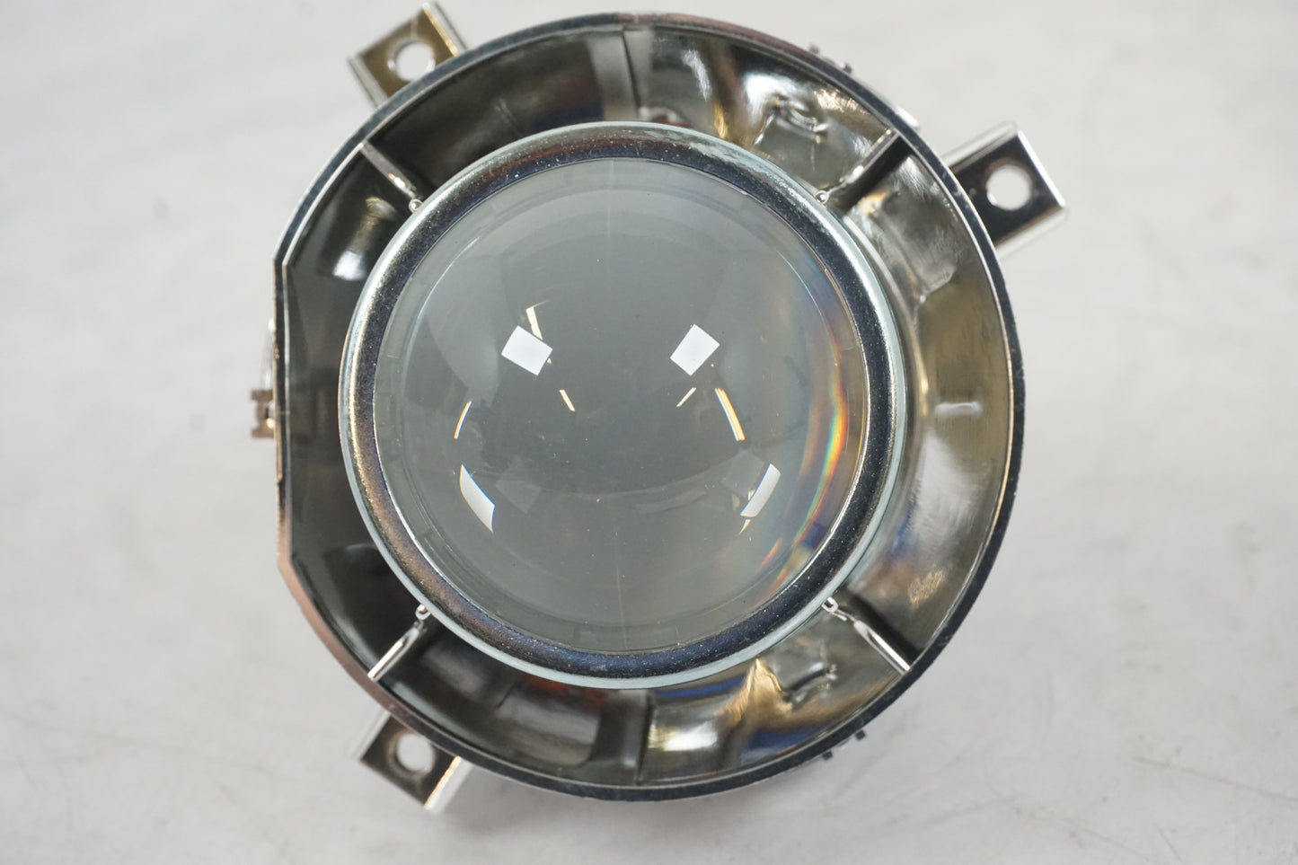 Baksidan på Strålkastarprojektor från en BMW R 1100 S -2001 motorcykel.