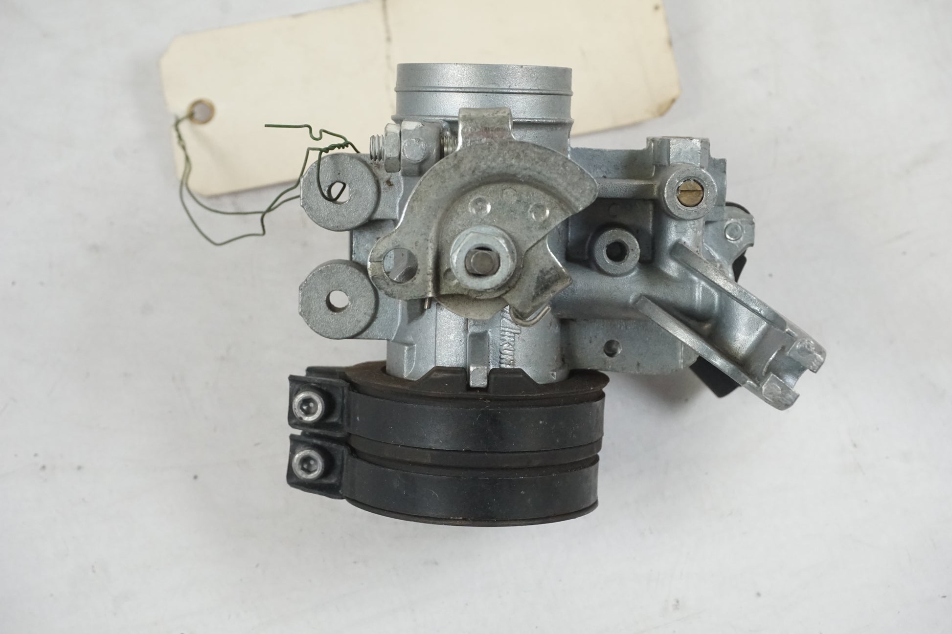 Höger sida på Spjällhus från en Yamaha YZF-R 125 -2008 motorcykel.