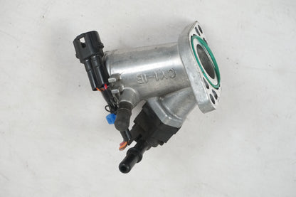 Framsidan på Spjällhus från en Yamaha YZF-R 125 -2010 motorcykel.