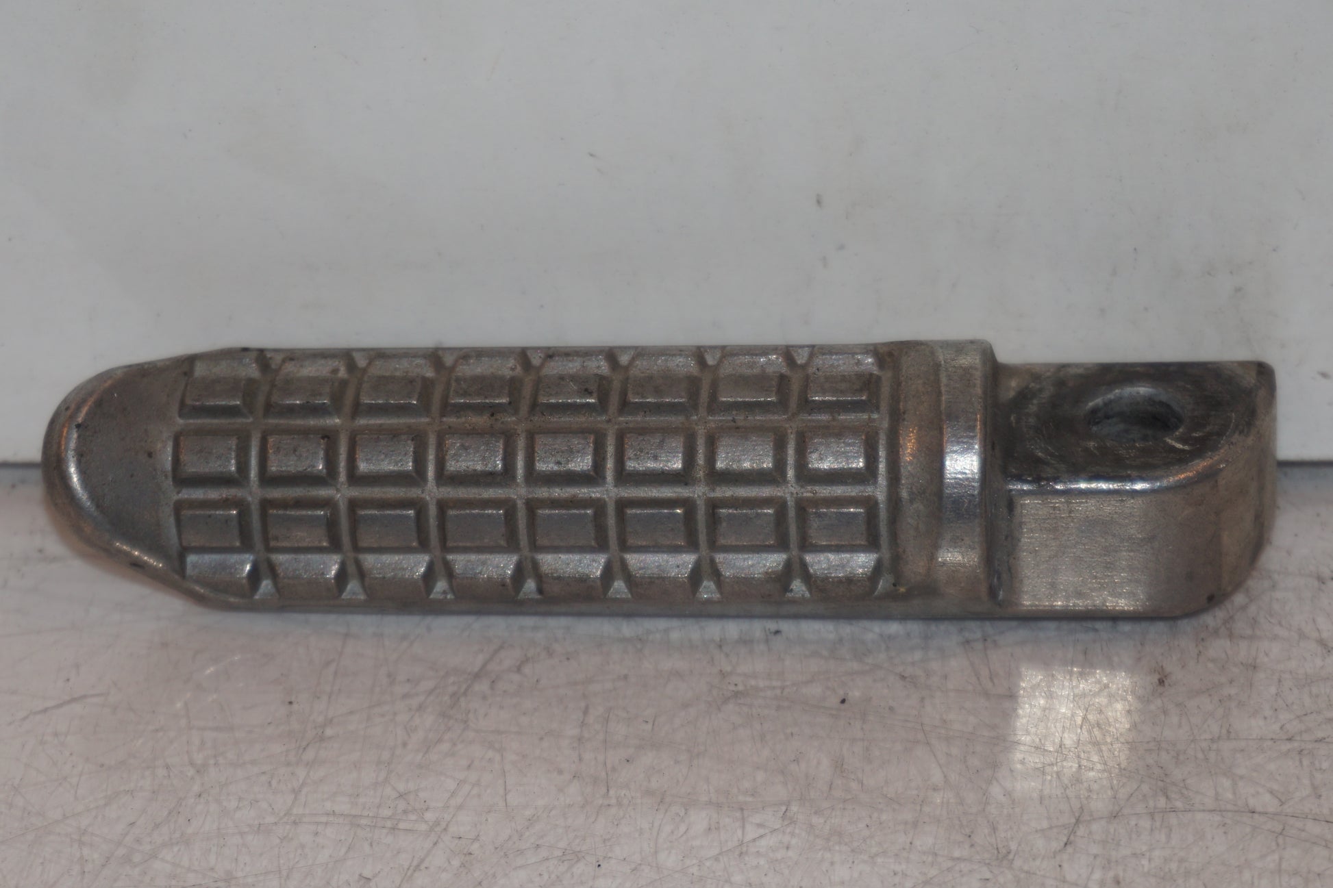 Framsidan på Fotpinne från en Kawasaki Ninja 300 -2014 motorcykel.