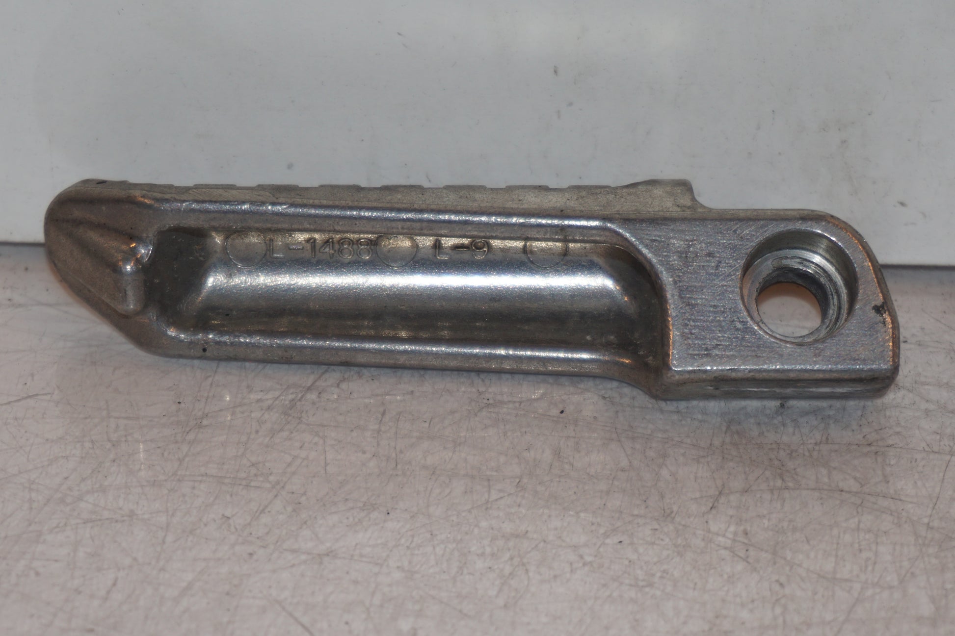 Höger sida på Fotpinne från en Kawasaki Ninja 300 -2014 motorcykel.