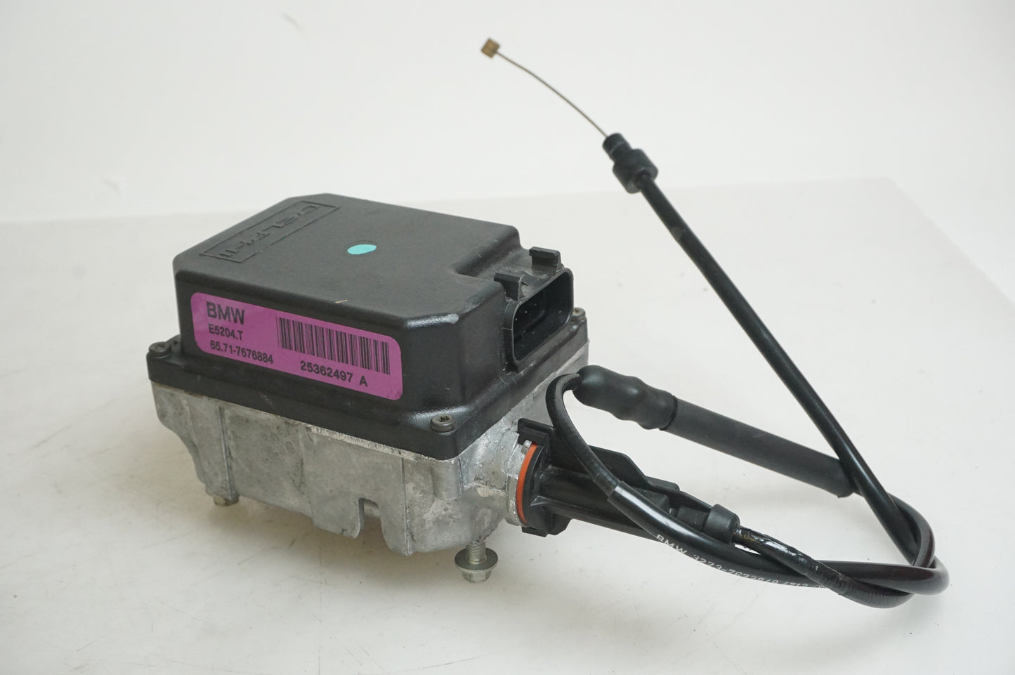 Framsidan på Farthållarservo från en BMW R 1200 RT -2013 motorcykel.