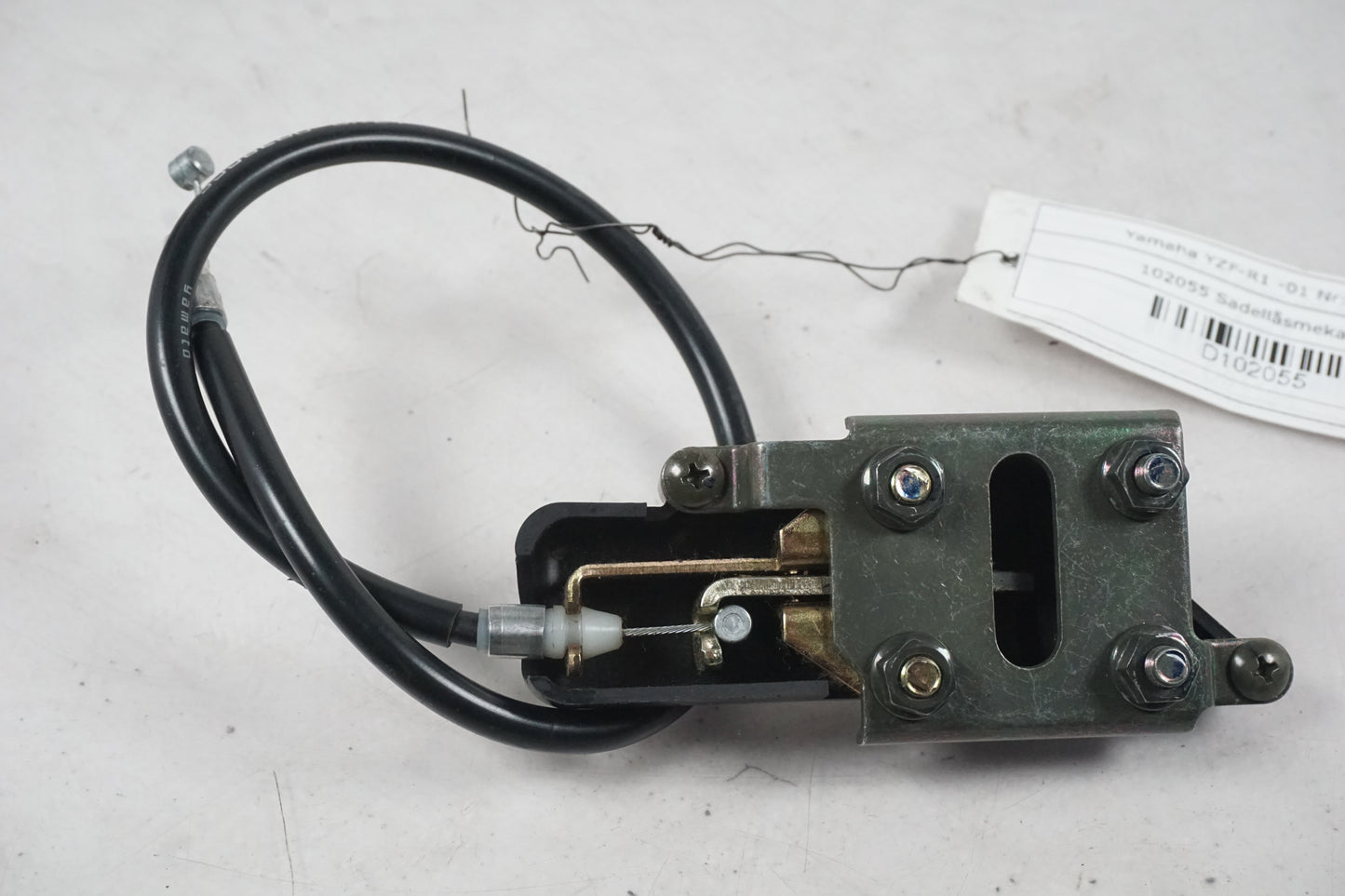 Baksidan på Sadellåsmekanism från en Yamaha YZF 1000 R1 -2001 motorcykel.