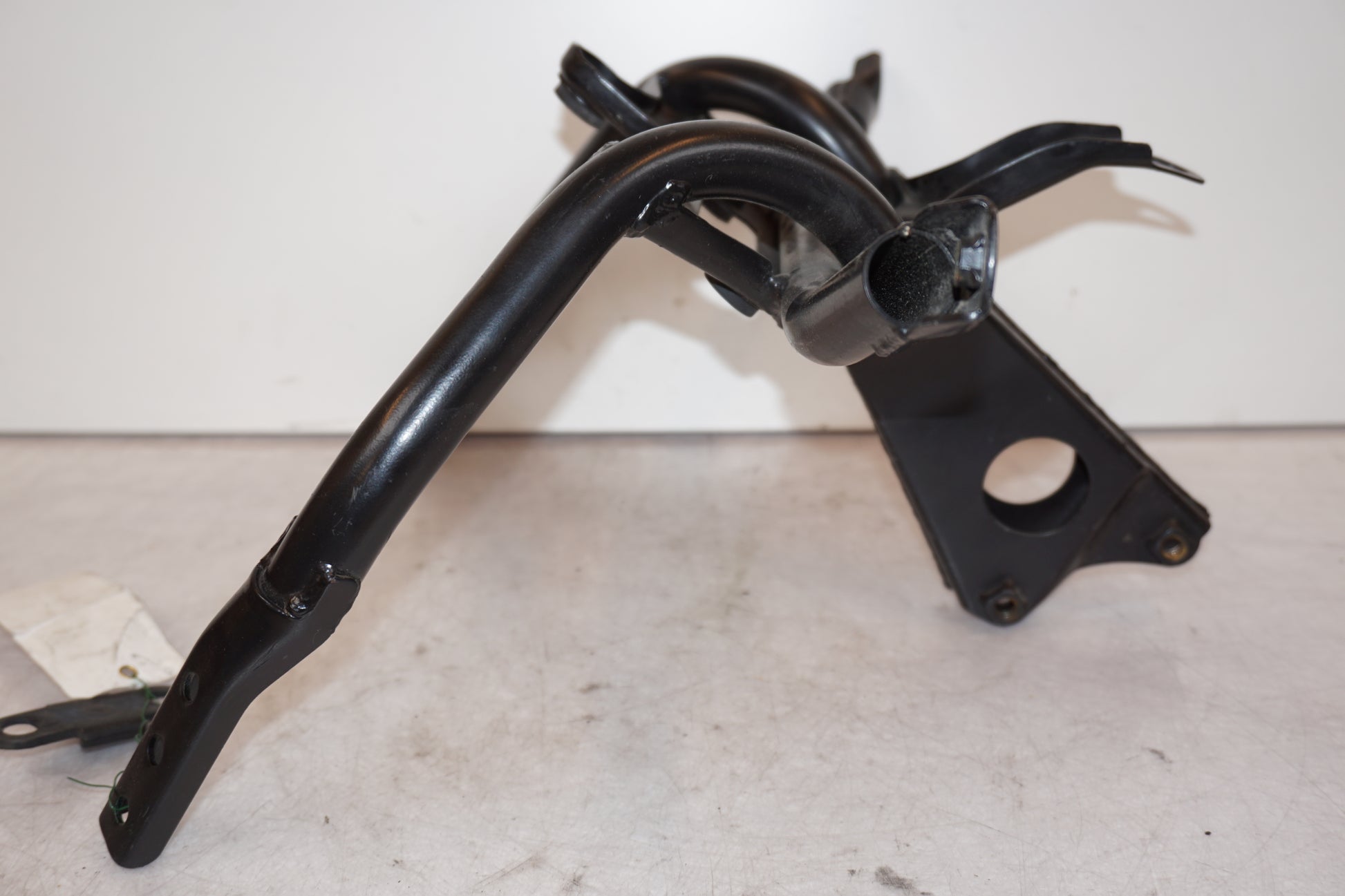 Vänster sida på Toppkåpstag från en Triumph Sprint RS -2004 motorcykel.