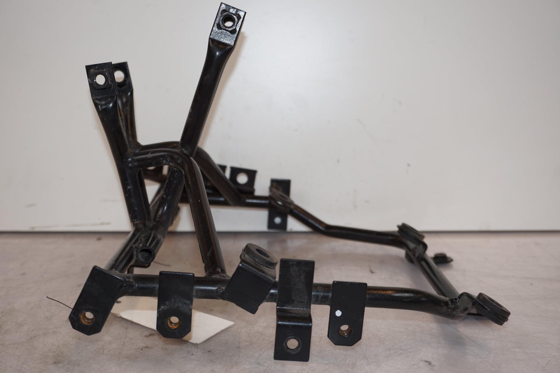 Baksidan på Toppkåpstag från en Triumph Tiger -2002 motorcykel.