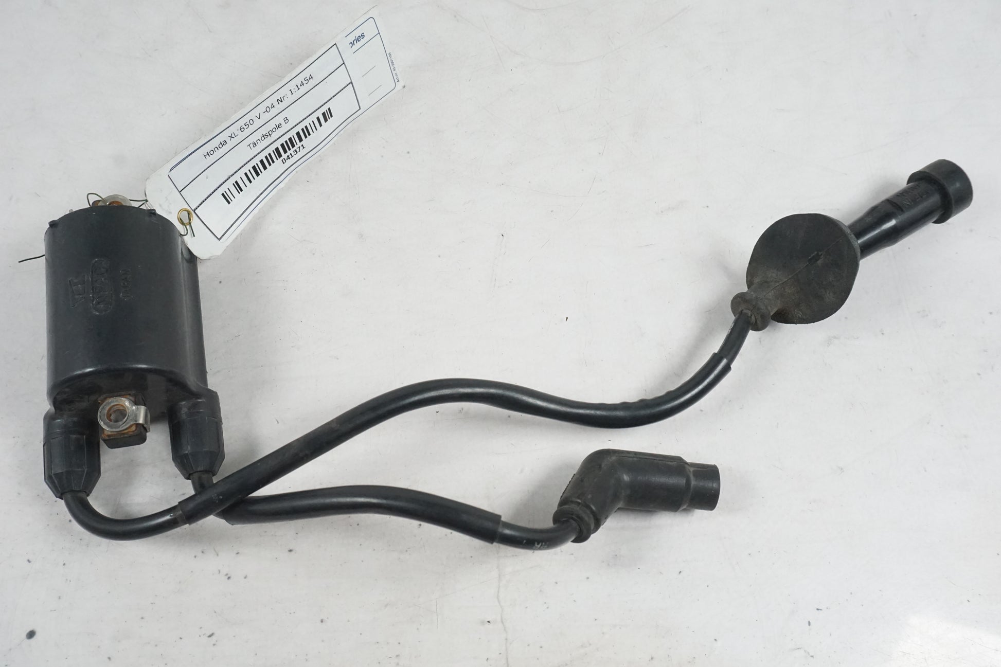 Framsidan på Tändspole från en Honda XL 650 V -2004 motorcykel.