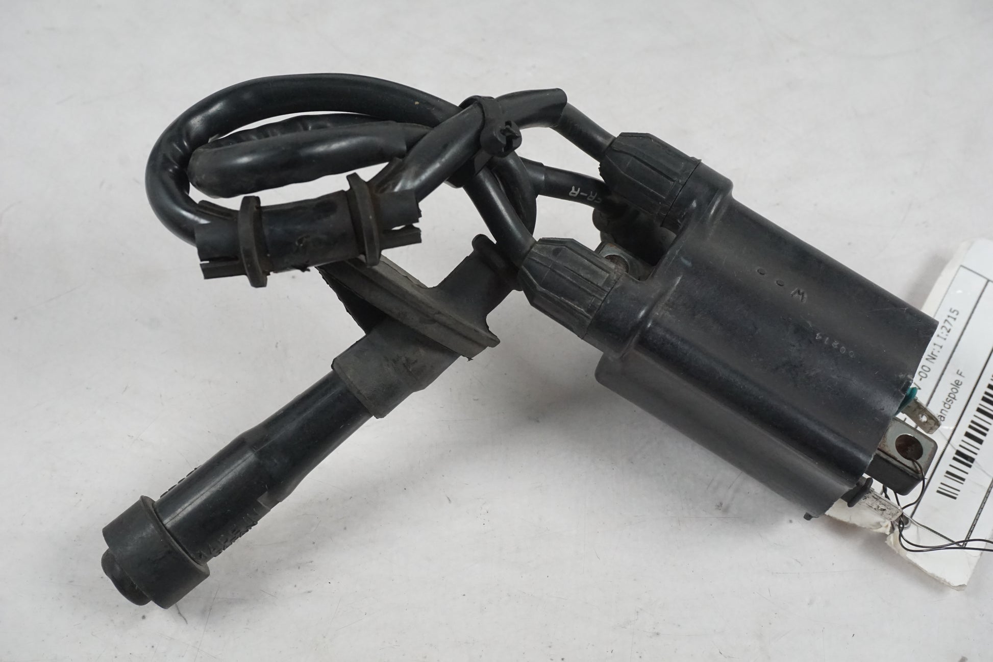 Baksidan på Tändspole från en Honda XL 650 V -2000 motorcykel.