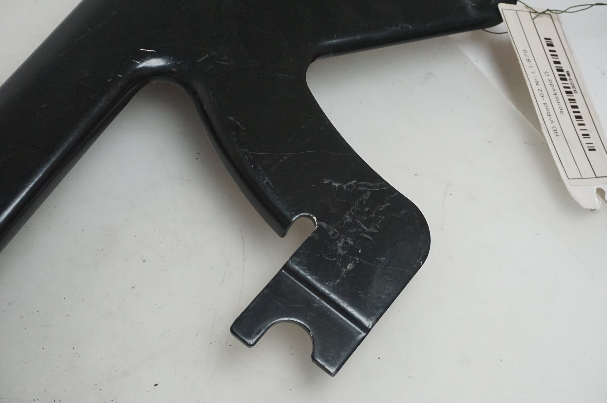 Snett uppifrån på Remskydd från en H-D V-Rod 1130 -2002 motorcykel.