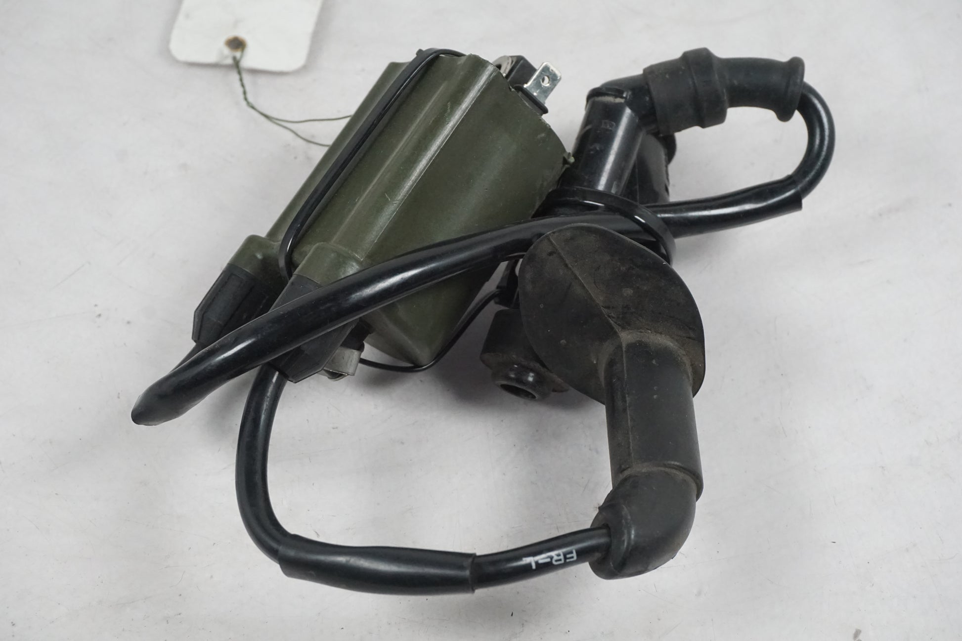 Baksidan på Tändspole från en Honda VT 750 -2008 motorcykel.