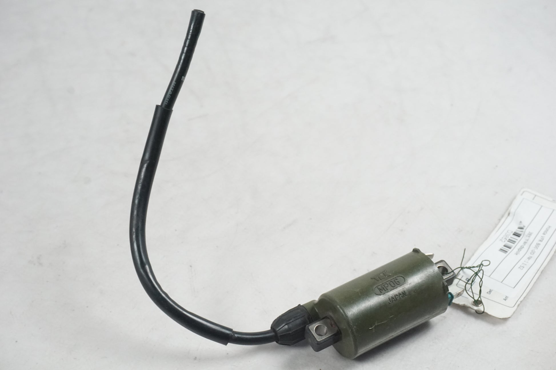 Baksidan på Tändspole från en Honda VFR 800 -2000 motorcykel.