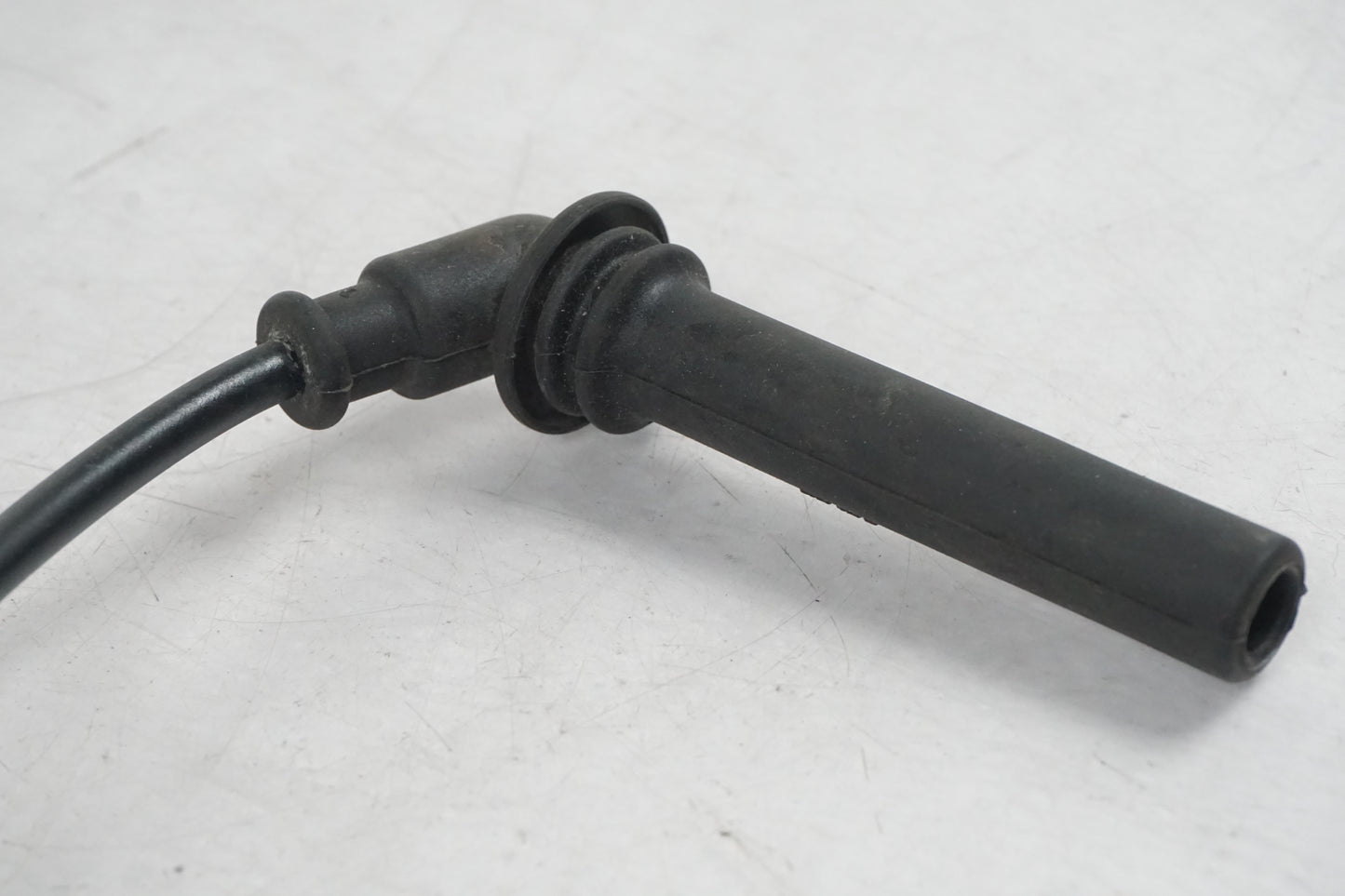 Vänster sida på Tändspole från en Kawasaki VN 900 -2007 motorcykel.