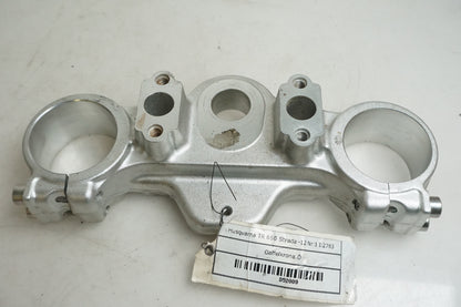 Baksidan på Gaffelkrona från en Husqvarna TR 650 Strada -2012 motorcykel.