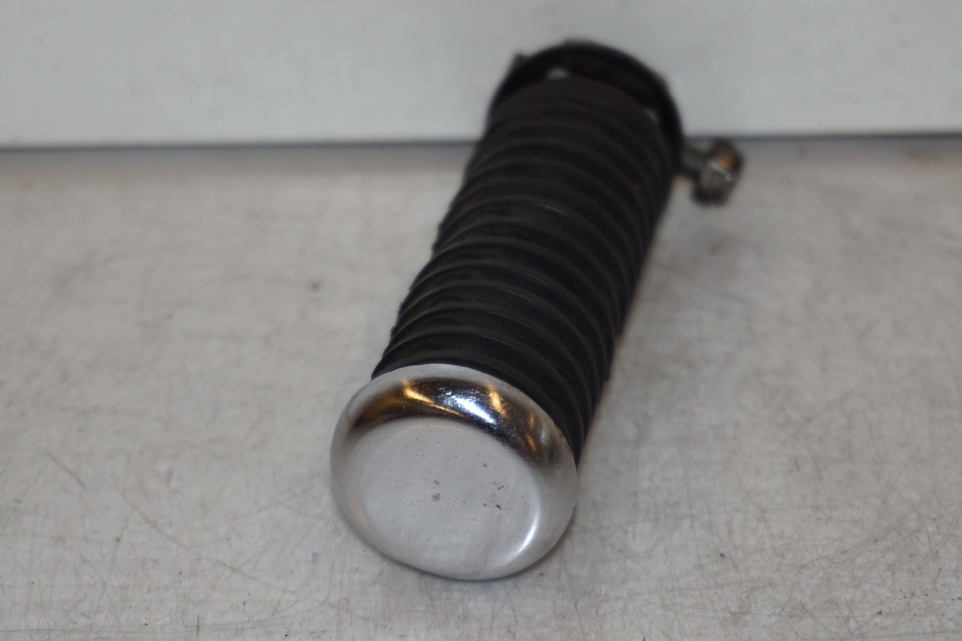 Höger sida på Fotpinne från en Honda VT 600 C -1994 motorcykel.