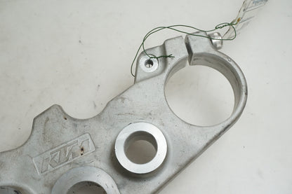 Höger sida på Gaffelkrona från en KTM 125 Duke -2014 motorcykel.