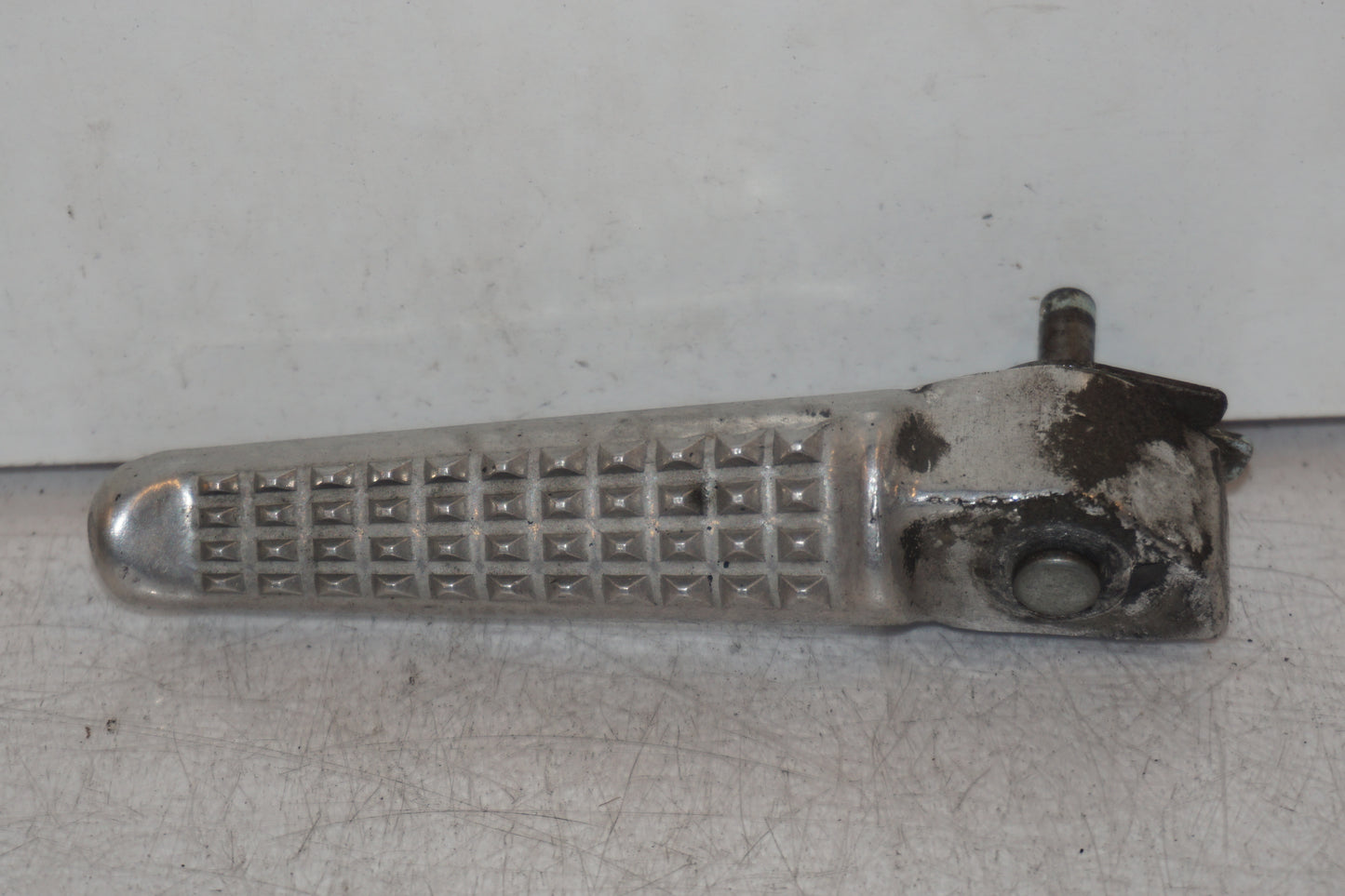 Framsidan på Fotpinne från en Honda VTR 1000 F -1997 motorcykel.