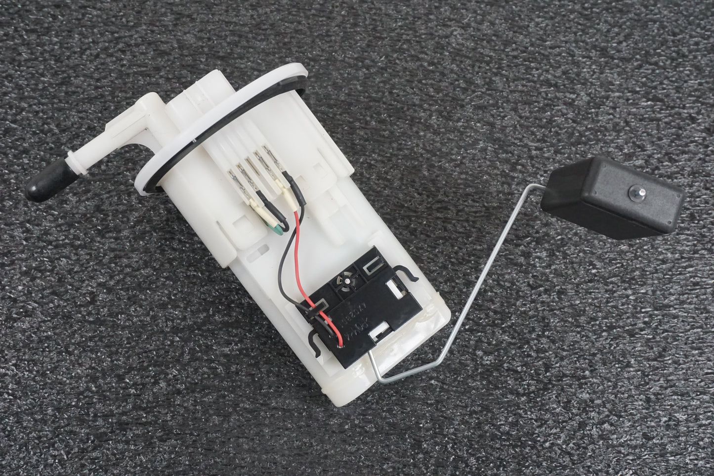 Framsidan på Bensinpump insprut från en Yamaha MT-07 -2014 motorcykel.