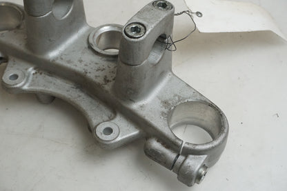 Baksidan på Gaffelkrona från en Yamaha XT 125 R -2005 motorcykel.