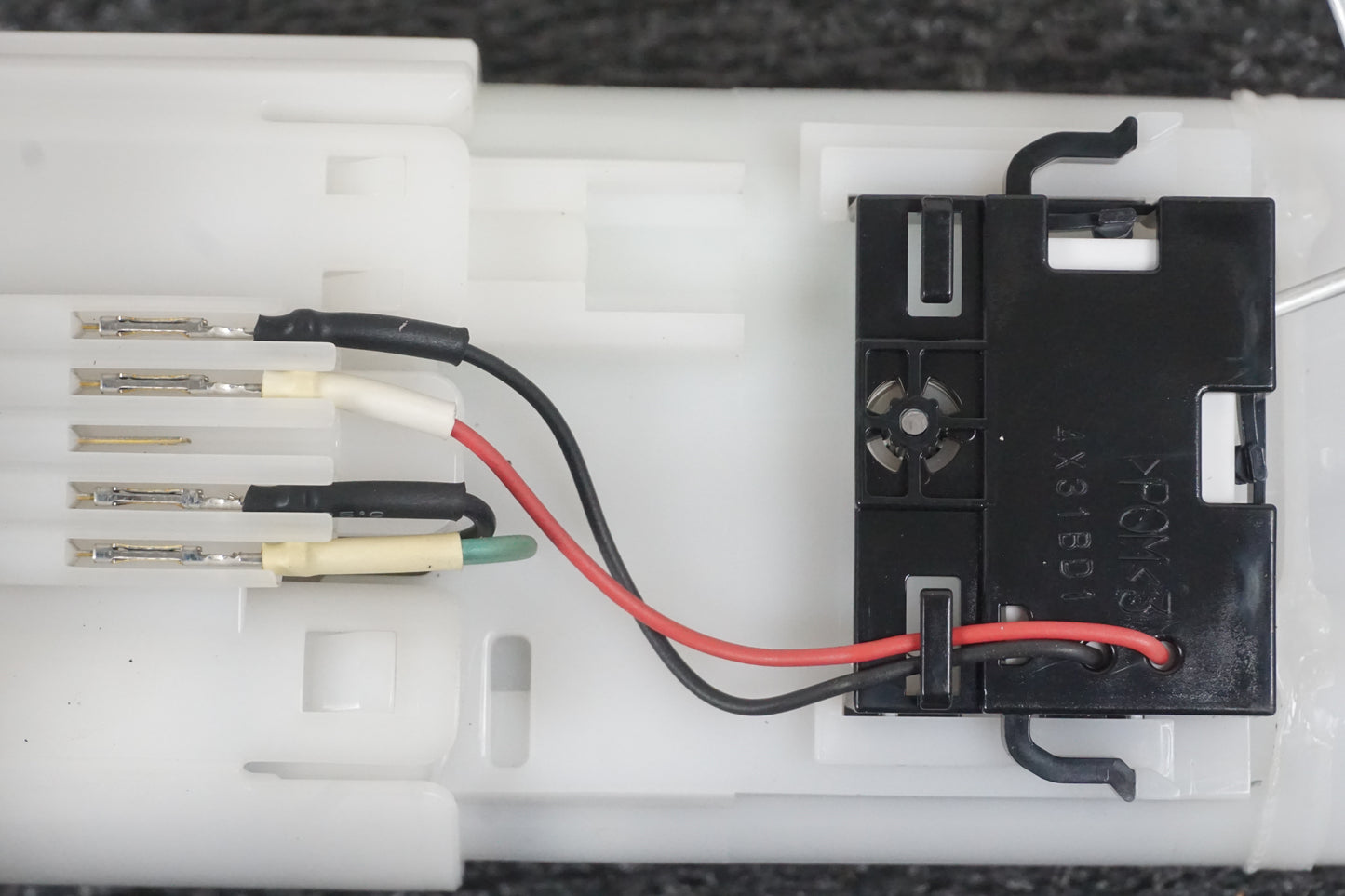 Baksidan på Bensinpump insprut från en Yamaha MT-07 -2014 motorcykel.