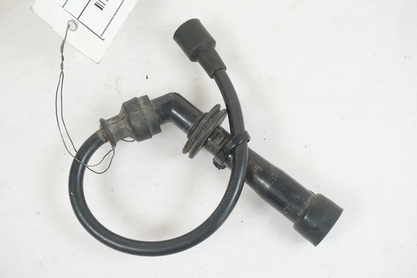 Framsidan på Tändspole från en Suzuki LTA 750 XP E -2009 motorcykel.