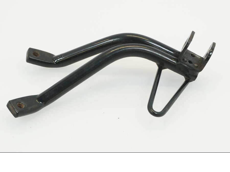 Höger sida på Fotpinnefäste från en Yamaha WR 125 -2010 motorcykel.