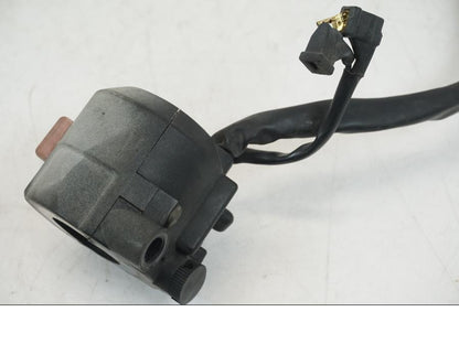 Vänster sida på Styrelreglage från en Honda NSR 125 -1991 motorcykel.