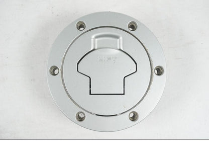 Höger sida på <p>Låssats från BMW R 1100 RS 1997.</p>

<p>2st nycklar, tändningslås, sadellås, tanklock.</p>

<p>Mindre lackskada på tanklocket se bild.</p> motorcykel.