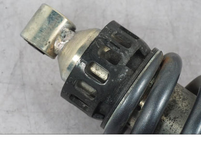 Vänster sida på Stötdämpare från en Suzuki GSF 1250 -2010 motorcykel.