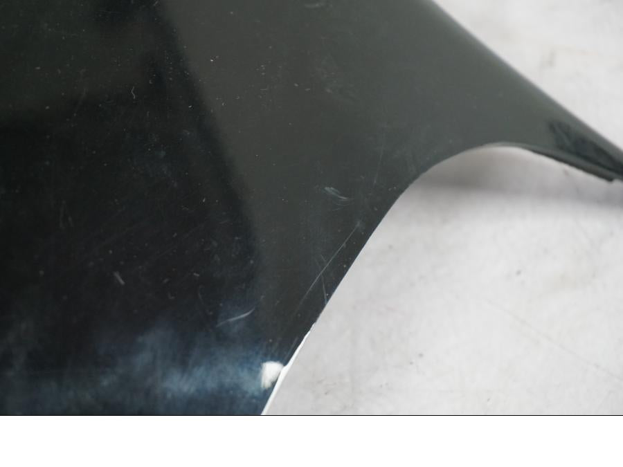 Baksidan på Ramskydd från en Honda VT 600 C -1998 motorcykel.