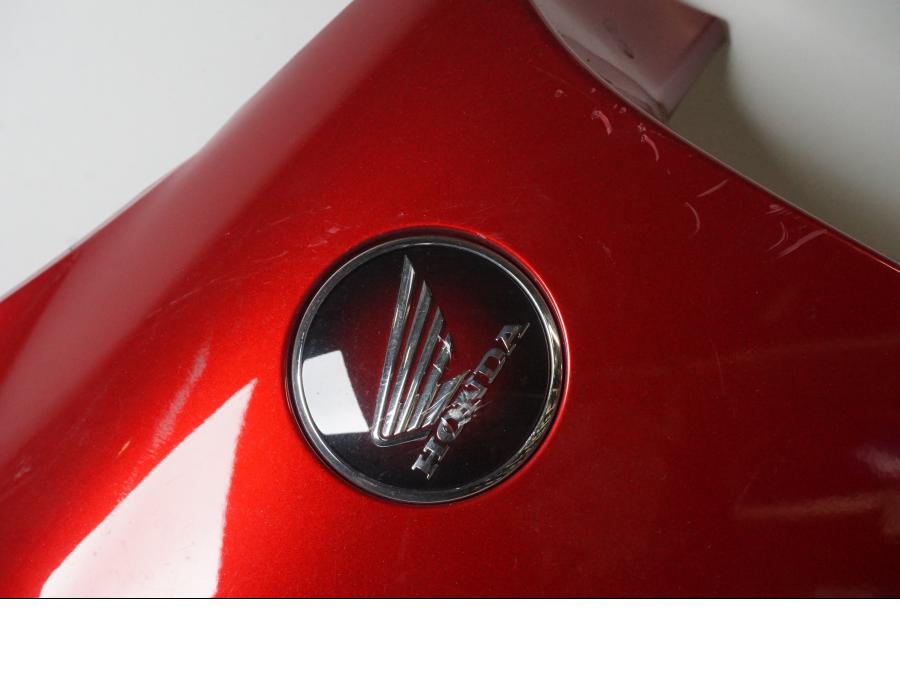 Vänster sida på Sidkåpa från en Honda VFR 1200 -2014 motorcykel.