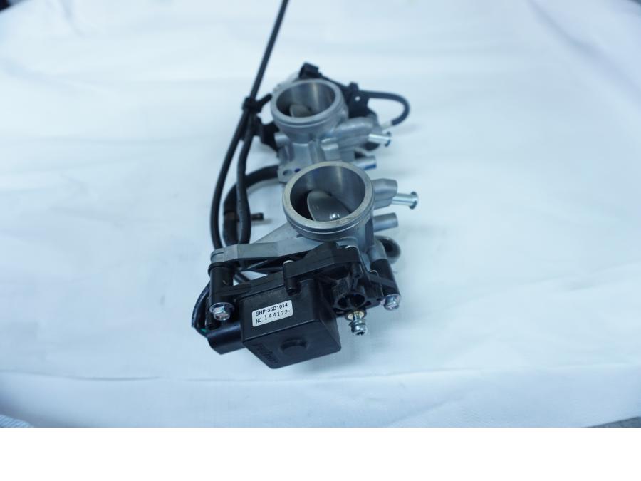 Baksidan på Spjällhus från en Kawasaki Ninja 650 -2018 motorcykel.