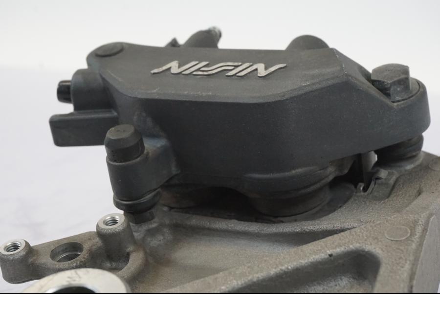 Vänster sida på Bromsok från en Honda NT 700 -2008 motorcykel.