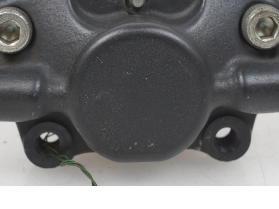 Baksidan på Bromsok från en Piaggio MP3 250 -2006 motorcykel.