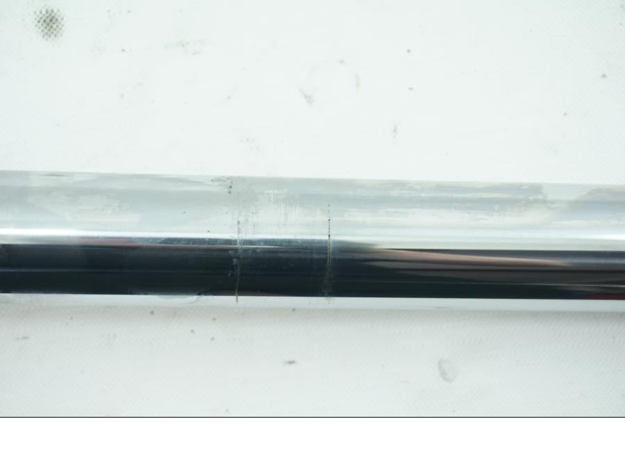 Snett uppifrån på Gaffelben från en Triumph Bonneville -2001 motorcykel.