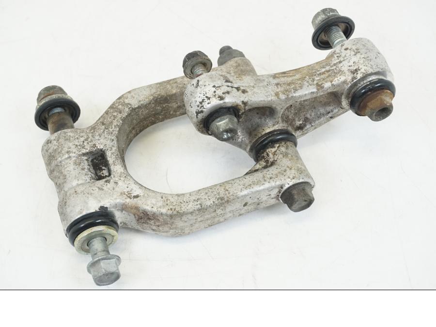 Framsidan på Stötdämparlänkage från en Honda NSR 125 -1991 motorcykel.