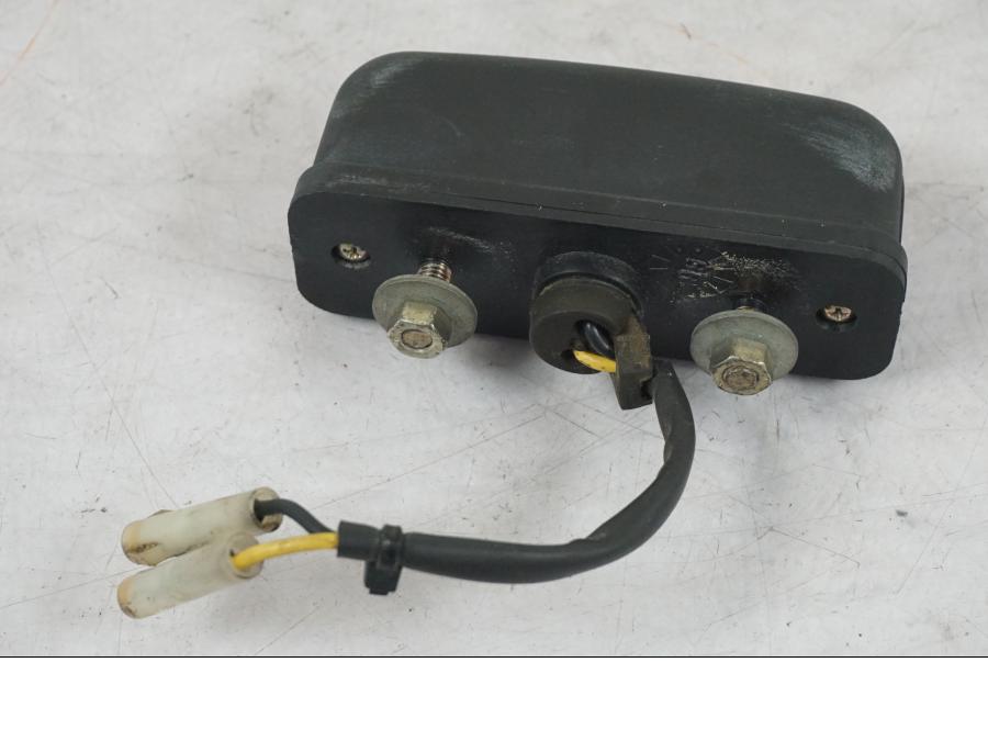 Vänster sida på Skyltbelysning från en Triumph Daytona 955I -2000 motorcykel.