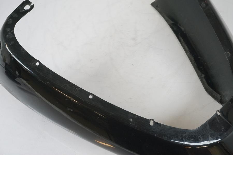 Snett nerifrån på Bakvinge från en Aprilia RS 125 -2000 motorcykel.